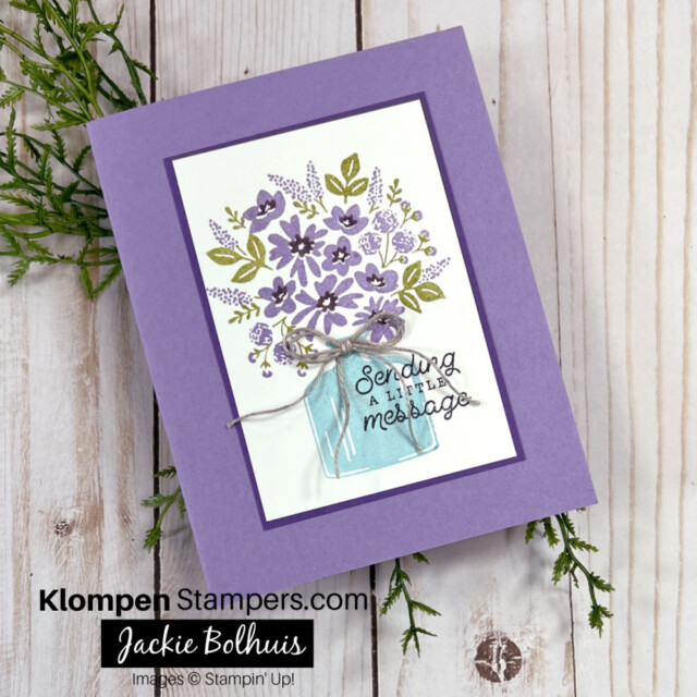 Stamped-blue-bottle-with-purple-flowers