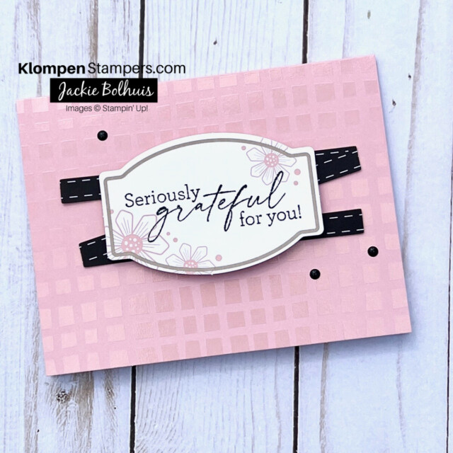 Handmade thank you card created with a thank you card kit. Card base is pink with a shiny texture. There is a black zig-zag in the middle with a stamped sentiment on top that reads seriously grateful for you!