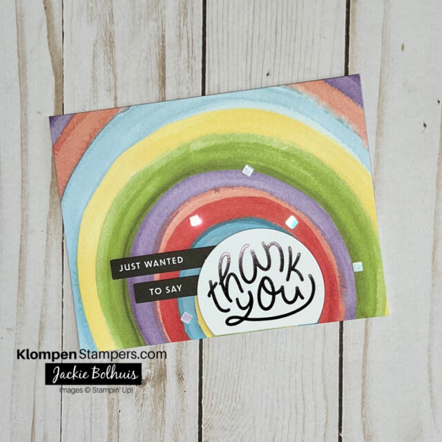 thank you card designed with the saying thanks card kit. card base is a circle pattern of different colors and the card reads "just wanted to say thank you"