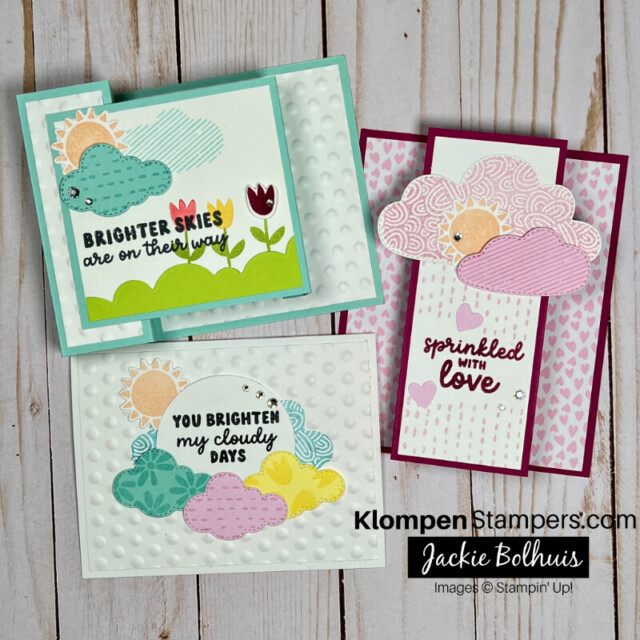 Featured photo for the card making project send a smile with a card. Three handmade cards that are designed with colorful clouds.