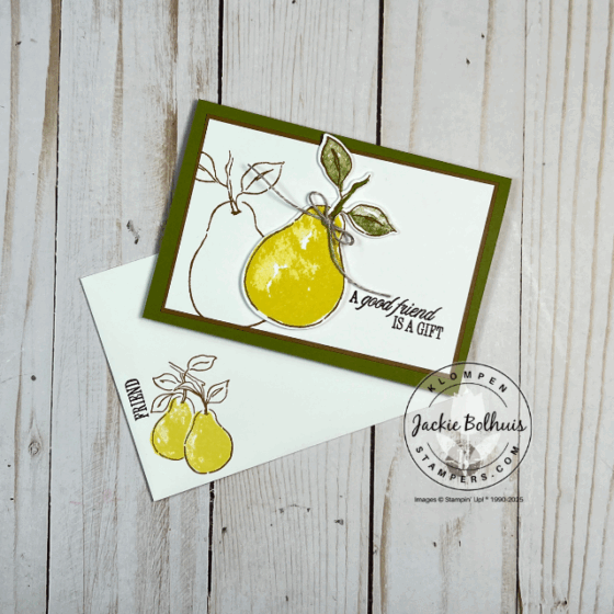 Close-up of a stamped card with a bold pear from Stampin’ Up!’s Perfectly Pears set, accented with a simple linen thread bow on a note card.