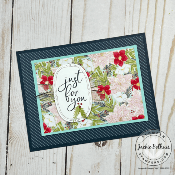 Front view of a Christmas fun fold gift card holder decorated with Traditions of Christmas Designer Series Paper and a festive sentiment label made using Stampin’ Up! Traditional Labels dies.