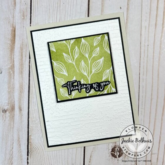 Close-up of a card featuring a floral pattern made with the emboss resist background technique and The Right Words sentiment.